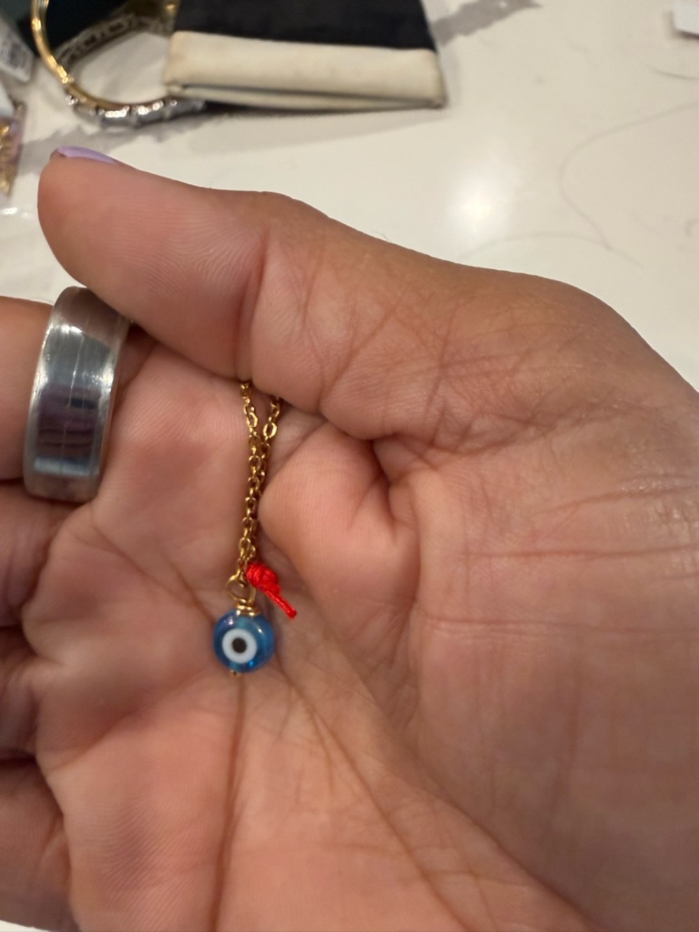 Gold Chain Necklace with Blue Evil Eye Charm and Red Accent